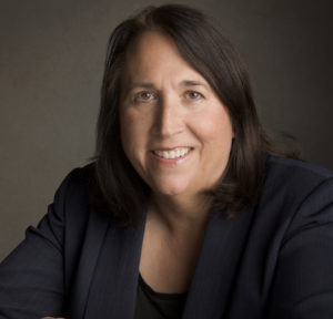 Portrait photo of Margaret Engel smiling