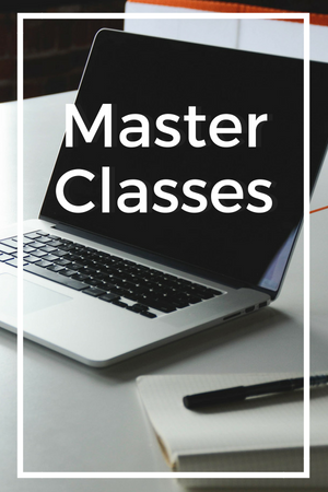 Laptop and notebook with words “Master Classes” on laptop